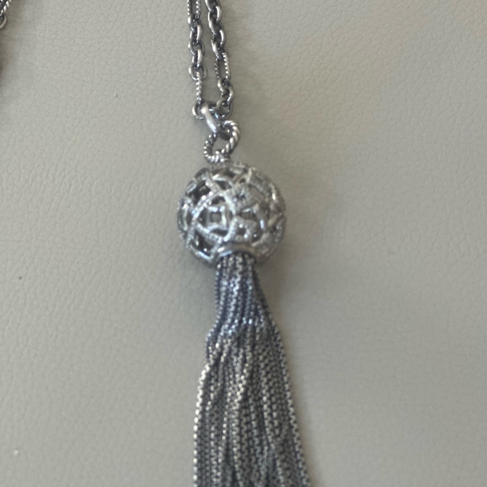 David yurman necklace 
Metal Type: Sterling Silver
Marks: 925
Gemstone: Diamond